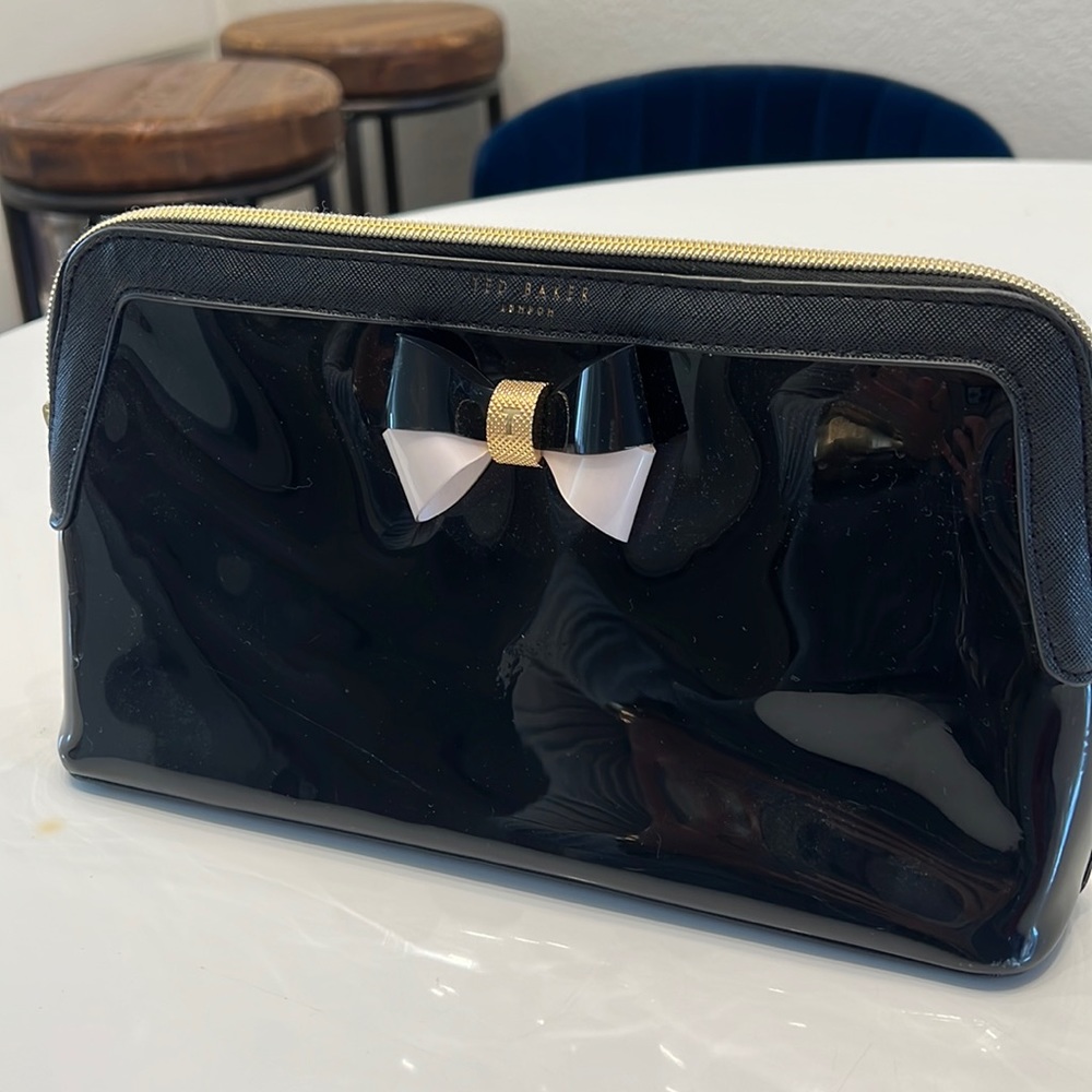 Ted Baker black cosmetic clutch with bow